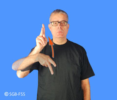 Photo du signe DAVANTAGE – Lexique de la langue des signes, Fédération Suisse des Sourds